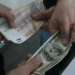 Официальный курс национальной валюты Сомони поднялся на один пункт