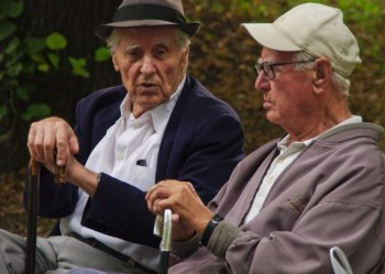 Two retirees chatting in Kamegdan Fort gardens. Elderly men.