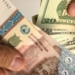 НБТ скорректировал официальный и небанковский курсы Сомони к Доллару