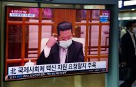 epa09943809 A man watches a news broadcast about the COVID-19 outbreak in North Korea, at a station in Seoul, South Korea, 13 May 2022. The North Korean state media agency (KCNA) announced an outbreak of COVID-19 in the country. A nation-wide lockdown was instituted in response and On 13 May, the first COVID-19 related deaths were reported.  EPA-EFE/JEON HEON-KYUN