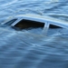 Гибель водителя в результате падения автомобиля в водосточный канал