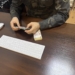 Офицер военкомата обвинён в получении взятки за отсрочку от службы